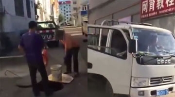 实拍三男子光天化日掏地沟油 追问之下自称清理下水道