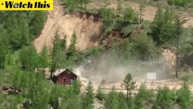 朝鲜拆除丰溪里核试验场 爆破现场掀大量尘土