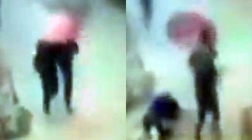 实拍峨眉山两大学生执意奔跑过险境 被山体落石击中