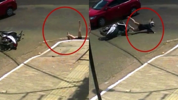 惨不忍睹！实拍：女骑手被轿车撞飞滚地 又“倒栽葱”跌进深坑中