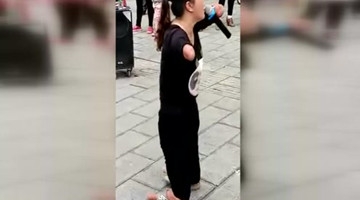 山东广饶15年前失踪女子变残街头乞讨 卖唱视频曝光