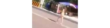 【拍客】实拍裸体失魂女子双黄线上漫步