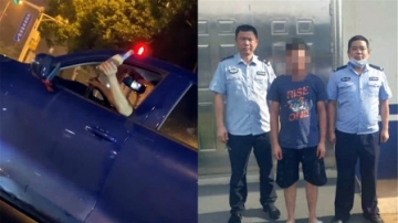 奇葩！实拍：男子为找存在感 开车等红绿灯时拿酒喝 警方：拘留