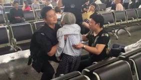 特警“公主抱”80岁老太火车站一路狂奔赶火车