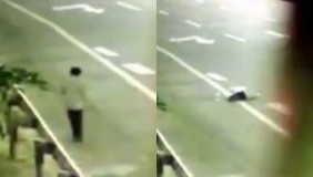男子遭货车碾过头部瞬间 持酒瓶躺马路中间身亡
