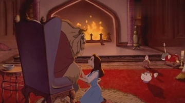 贝儿帮受伤的野兽清理伤口，暴躁的野兽也显露出了温柔的一面