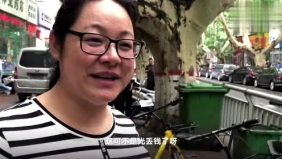 单车上捡近万元现金 母女俩次日回原地寻失主