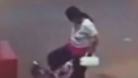 青岛4岁女孩路边遭陌生女子暴打 遭其拽倒在地用脚狠踹