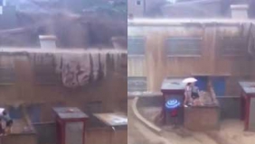 【拍客】实拍女护士被洪水冲走瞬间 围观女子痛哭嘶吼惊心