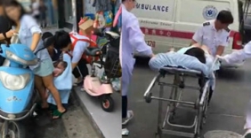 孕妇当街骑着电瓶车 突然停下淡定站着生娃