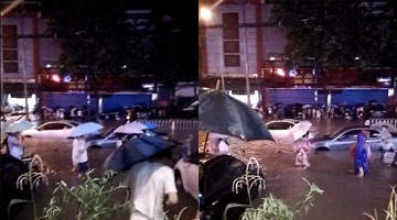 实拍西安暴雨袭城 积水及腰多车泡水中