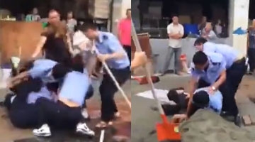 实拍数十城管持铁锹围殴妇女 一旁孩子也遭欺凌