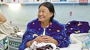 女子一场感冒“冷”7年 三伏天穿棉衣烤火