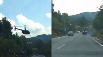 实拍重庆一观光直升机低飞 螺旋桨打到路灯坠落