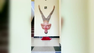 牛人绝活铁头功〈头顶钢筋悬空倒立〉