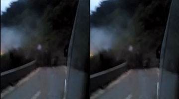 实拍公交逃离山崩瞬间 司机倒车10米救一车人