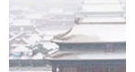 实拍北京三月突降大雪 市民争相合影留念