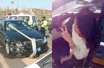 【拍客】实拍奔驰女车祸摆剪刀手 称会担责传递正能量