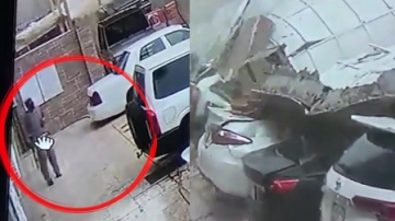 实拍！墙体垮塌砸扁四台小车，一米外男子贴墙走与死神擦肩而过