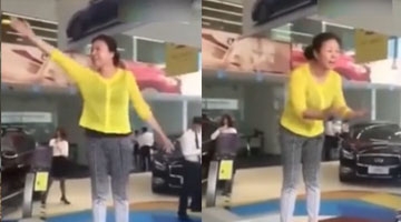 女子大闹4S店阻止卖日本车 嘶喊:你们对得起祖宗吗？