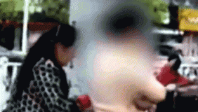 女子闯红灯被拦竟脱衣 拉住交警喊“非礼