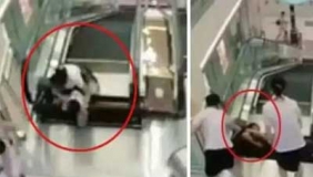 【拍客】女子被卷入扶梯身亡 命悬一刻不忘托举儿