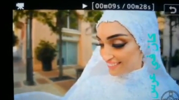 实拍黎巴嫩大爆炸突然来袭 一对新人正举行婚礼  新郎拉着新娘就跑