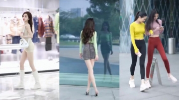 街拍美女：美女腿真长呀，连警示牌都轻松跨过