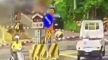 监拍台湾女子卧轨自杀 刚趴下便遭火车碾压