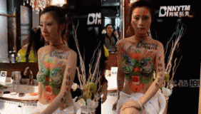 裸体彩绘嫩模遭近距离拍摄当场发飙