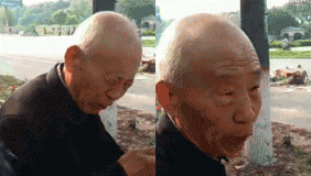 码头一个向影视城路倒垃圾的老人