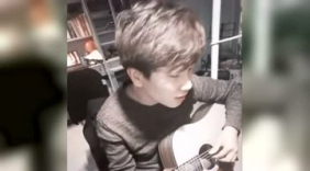 帅哥选手李杰弹吉他献唱