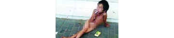 女童赤身抽烟在街头乞讨 其父嫌累不愿工作