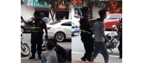 【拍客】实拍两男子当街被暴力“执法”